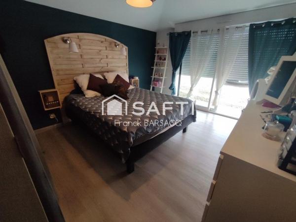 VILLA DE PLAIN PIED AVEC GRAND GARAGE ET JARDIN