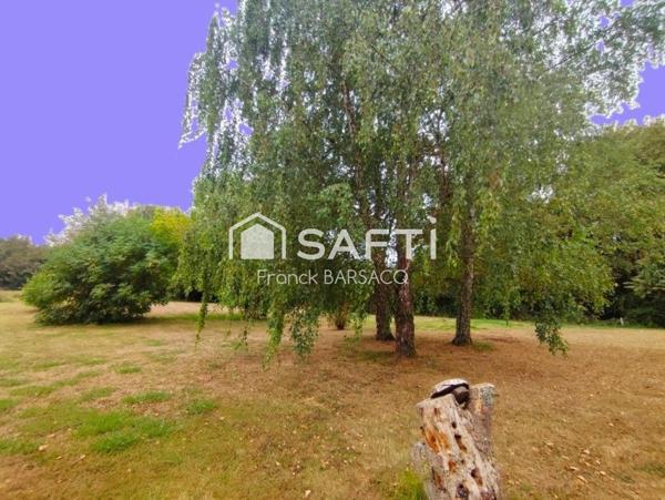 VILLA DE PLAIN PIED AVEC GRAND GARAGE ET JARDIN