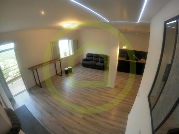 Appartement en rez-de-jardin à GATTIERES (06510)