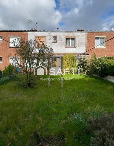 Maison 3 chambres jardin et garage proche commodités