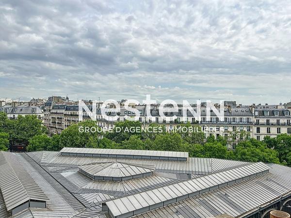 Nestenn - Paris 10e - Saint-Vincent-de-Paul - Appartement + Surface Commerciale de 66 m2 - 6e étage avec ascenseur - Vue dégagée sur Paris - Cave