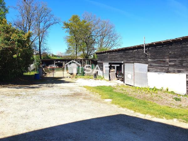 Longère rénovée + piscine + hangar et garages