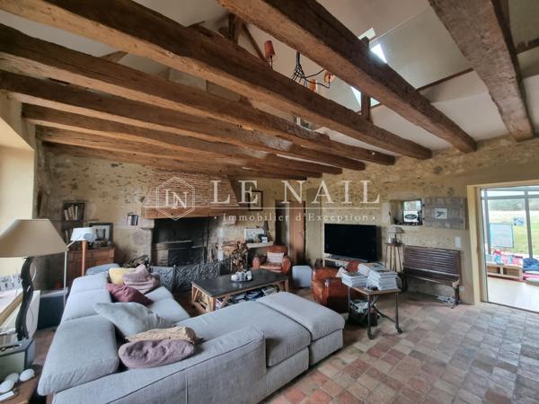 Ancien corps de ferme avec maison d'amis et 16 hectares à 20 km de Tours.