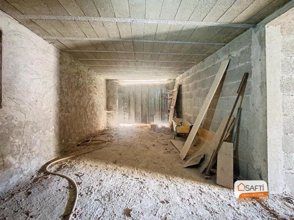 Ancienne grange à deux pas du centre-bourg