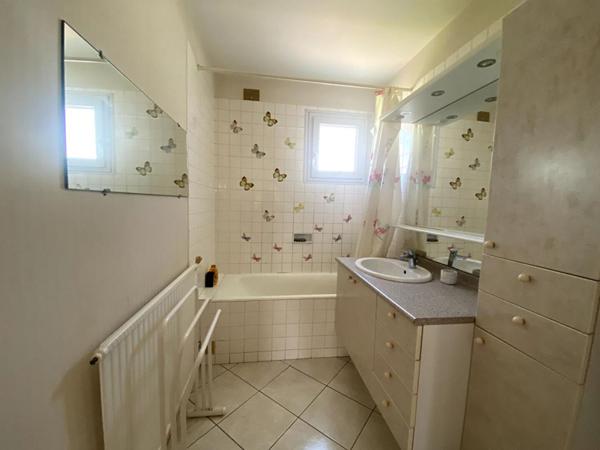LA BAULE QUARTIER  FLORALIES MAISON DE 86 m2 ENVIRON AVEC GARAGE ET JARDIN