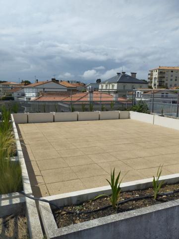 Appartement au marché central de Royan avec jardin et toit-terrasse, possibilité de garage