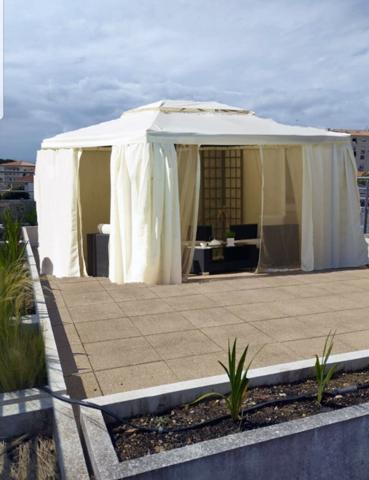 Appartement au marché central de Royan avec jardin et toit-terrasse, possibilité de garage