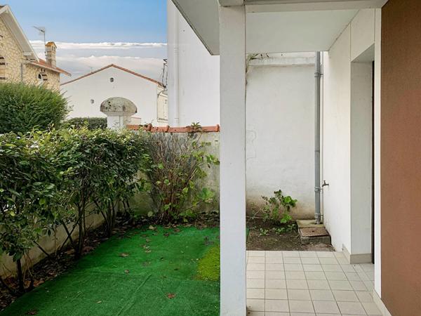 Appartement au marché central de Royan avec jardin et toit-terrasse, possibilité de garage