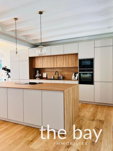 Gujan-Mestras (33470) Gujan-Mestras – Maison de plain-pied aux prestations haut de gamme, avec piscine et grand séjour de 87 m²