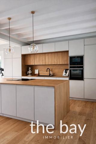 Gujan-Mestras (33470) Gujan-Mestras – Maison de plain-pied aux prestations haut de gamme, avec piscine et grand séjour de 87 m²