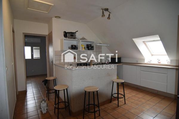 Immeuble de rapport avec garages et parking