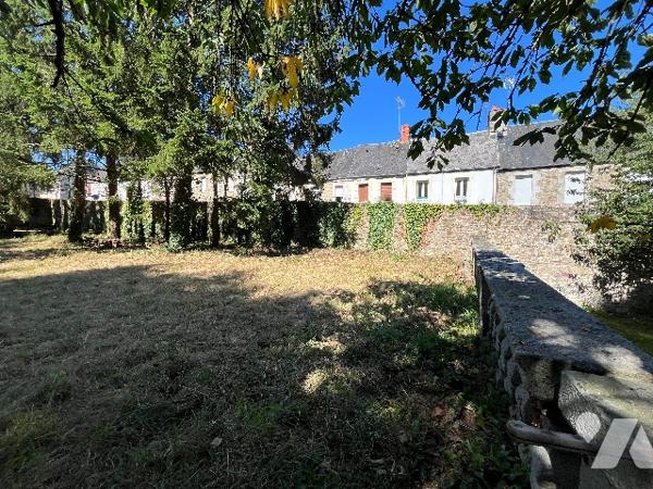 Au cœur de la ville,  terrain à bâtir, non viabilisé.