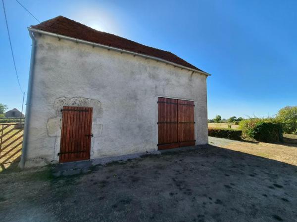 Belle maison avec grange et terrain