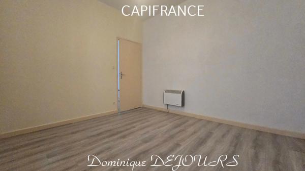 Maison composée de 2 appartements (57 et 43m²) et d'un grand garage de 100m².