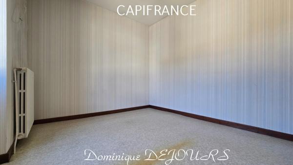 Maison composée de 2 appartements (57 et 43m²) et d'un grand garage de 100m².