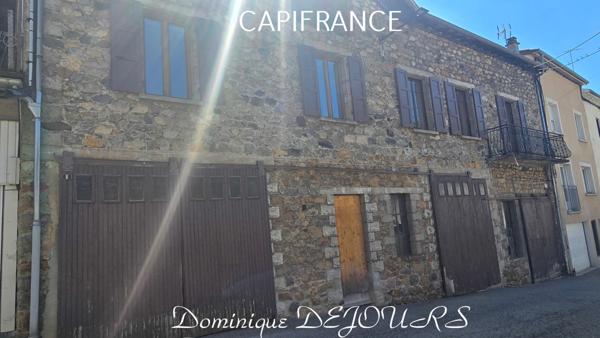 Maison composée de 2 appartements (57 et 43m²) et d'un grand garage de 100m².