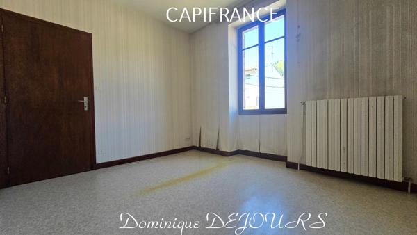 Maison composée de 2 appartements (57 et 43m²) et d'un grand garage de 100m².