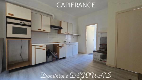 Maison composée de 2 appartements (57 et 43m²) et d'un grand garage de 100m².