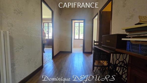 Maison composée de 2 appartements (57 et 43m²) et d'un grand garage de 100m².