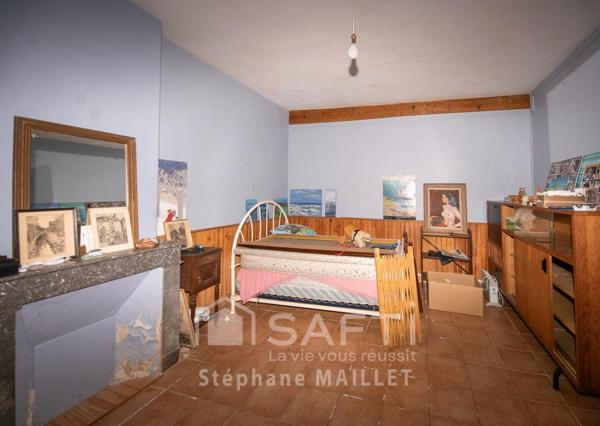 Maison de ville spacieuse au fort potentiel