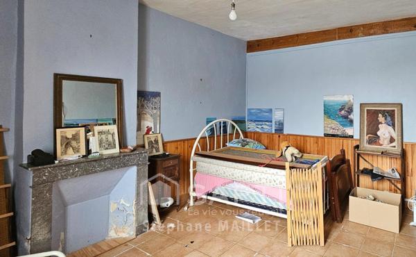 Maison de ville spacieuse au fort potentiel