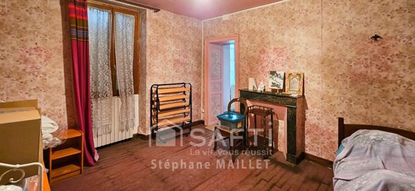 Maison de ville spacieuse au fort potentiel