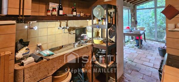 Maison de ville spacieuse au fort potentiel