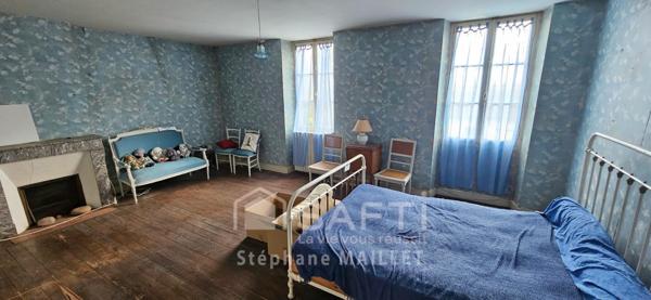 Maison de ville spacieuse au fort potentiel