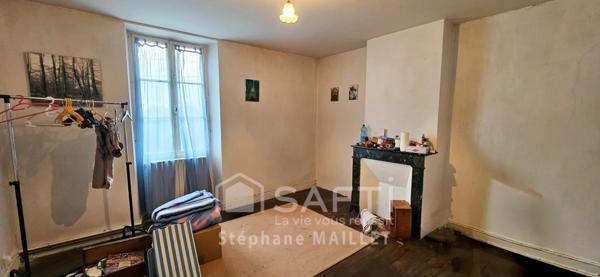 Maison de ville spacieuse au fort potentiel