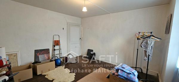 Maison de ville spacieuse au fort potentiel