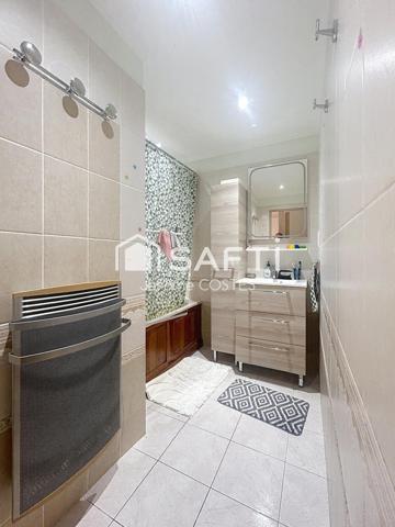 Immeuble d’environ 220m2 composé de 5 appartements