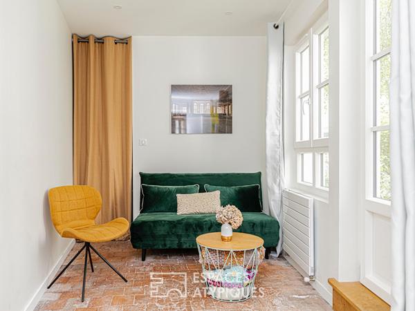 Une maison familiale de charme avec cour-jardin et garage