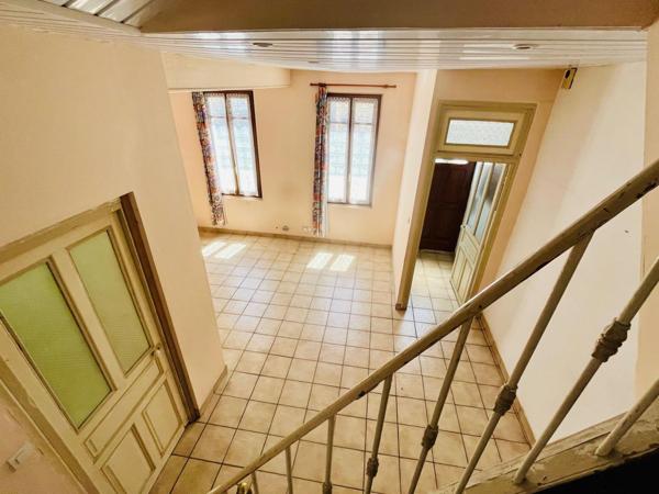 Bel ensemble immobilier avec jardin (200/220m2)