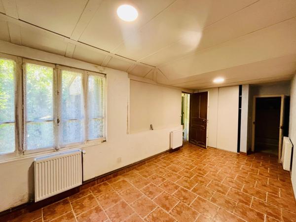 Bel ensemble immobilier avec jardin (200/220m2)