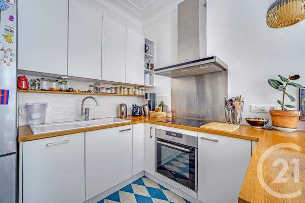 Appartement à vendre  4 pièces - 77 m 2   PARIS  - 75018