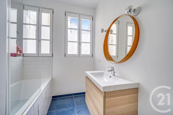 Appartement à vendre  4 pièces - 77 m 2   PARIS  - 75018