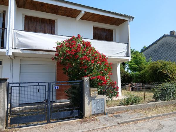 Maison T4 avec garage et jardin