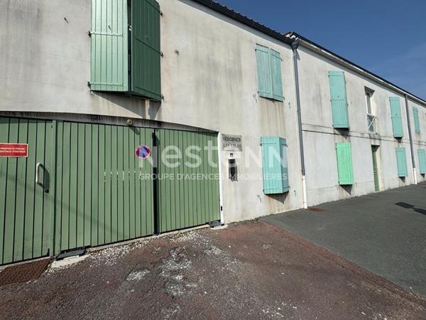 Appartement T2 proximité centre-ville - 51m² avec terrasse et place de parking