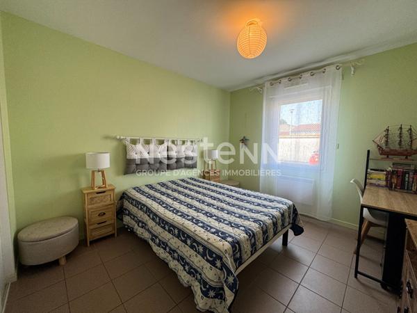 Appartement T2 proximité centre-ville - 51m² avec terrasse et place de parking