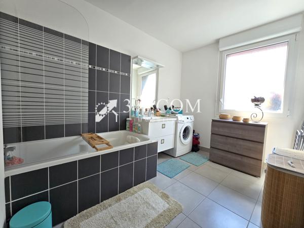 Rez de jardin 3 pièce(s) 2 chambre(s) 68 m²