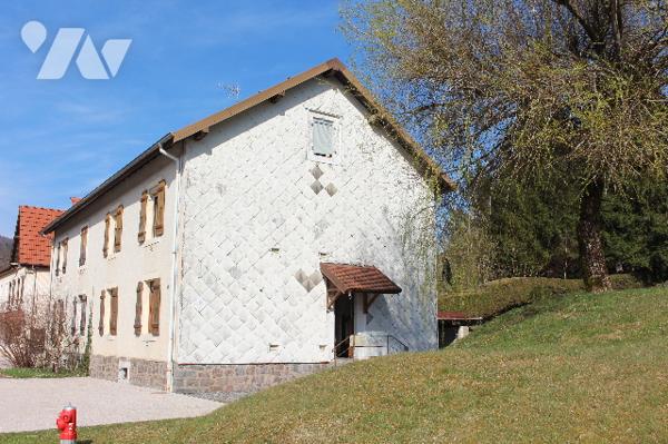 Maison mitoyenne d'env. 130m² habitable  sur 1293m² de terrain avec garage et terrasse couverte