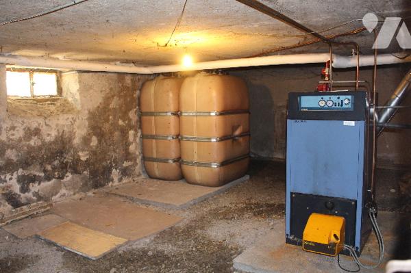 Maison mitoyenne d'env. 130m² habitable  sur 1293m² de terrain avec garage et terrasse couverte