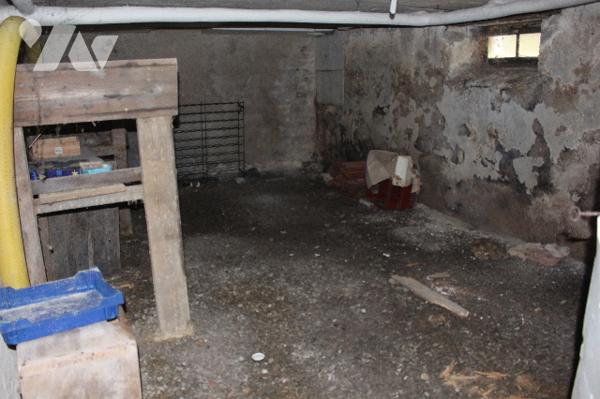 Maison mitoyenne d'env. 130m² habitable  sur 1293m² de terrain avec garage et terrasse couverte