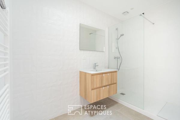 Appartement rez-de-jardin rénové au coeur de Saint-Didier-de-Formans