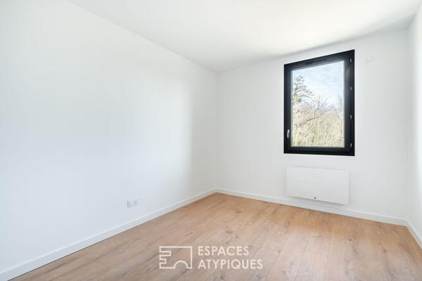 Appartement rez-de-jardin rénové au coeur de Saint-Didier-de-Formans