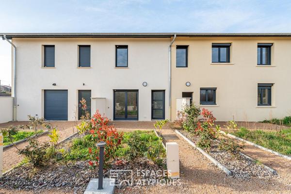 Appartement rez-de-jardin rénové au coeur de Saint-Didier-de-Formans