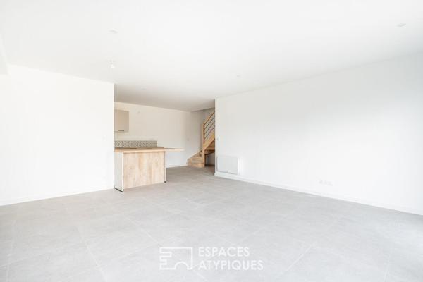 Appartement rez-de-jardin rénové au coeur de Saint-Didier-de-Formans