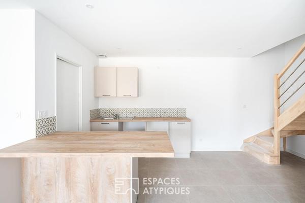 Appartement rez-de-jardin rénové au coeur de Saint-Didier-de-Formans