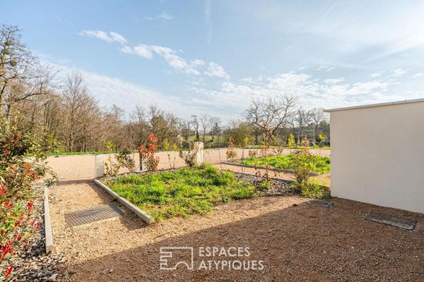 Appartement rez-de-jardin rénové au coeur de Saint-Didier-de-Formans