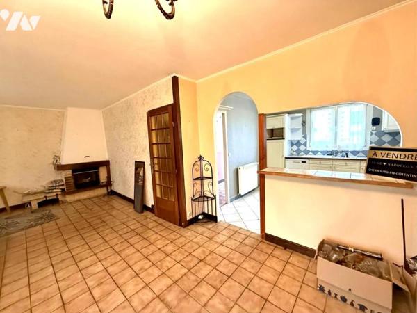 TOURLAVILLE Nouveauté- maison de plain pied bon état général.